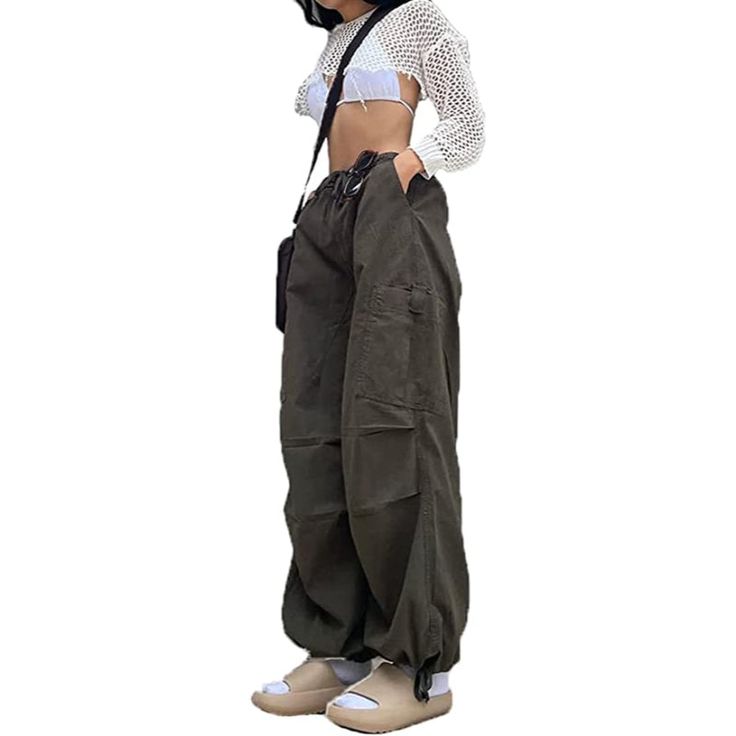 Elevate your fashion sense with these amazing baggy cargo pants and give your personality an enticing vibe. These loose hip-hop pants are elegantly made and are super-stylish as well. Premium materials are used in making and these are quite comfortable and durable as well. These pants are available in different color options, so choose your favorite one. Specifications: Fabric Type: Synthetic Care Instructions: Hand Wash Only Closure Type: Drawstring Rise Style: High Rise About this Item: Materi High-waisted Cargo Jeans For Summer Streetwear, High-waisted Summer Cargo Jeans For Streetwear, Summer Streetwear High-waisted Cargo Jeans, Harajuku Style Baggy Wide Leg Pants, Techwear Harem Pants With Pockets For Streetwear, Cotton Techwear Harem Pants For Streetwear, Baggy Cargo Jeans For Spring Streetwear, Techwear Style Harem Pants For Streetwear With Pockets, Hip Hop Style Pants For Outdoor Activities With Pockets