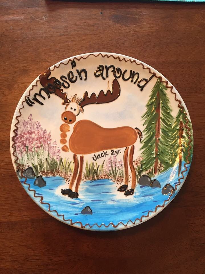 a plate with an image of a moose on it