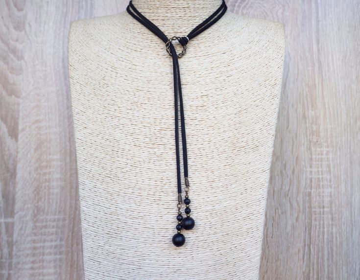 "Long Cord Necklace Lariat Tie Choker Choker Onyx Necklace Suede Wrap Necklace Long Tie Necklace Vegan Choker Black Suede Necklace ~ Long Wrap Necklace with cord and onyx beads. - Made of metal and black colour suede cord, ~ Made with the utmost care to enjoy it as long as possible. All jewelries are are in stock and ready to be shipped within 1-2 business day from ordering to dispatch. Please note these times increase during Christmas & busy periods. 🌍 SHIPPING & DELIVERY This necklace is read Tie Choker, Suede Necklace, Art Nouveau Necklaces, Choker Black, Tie Necklace, Wrap Necklace, Wrap Necklaces, Onyx Necklace, Suede Cord