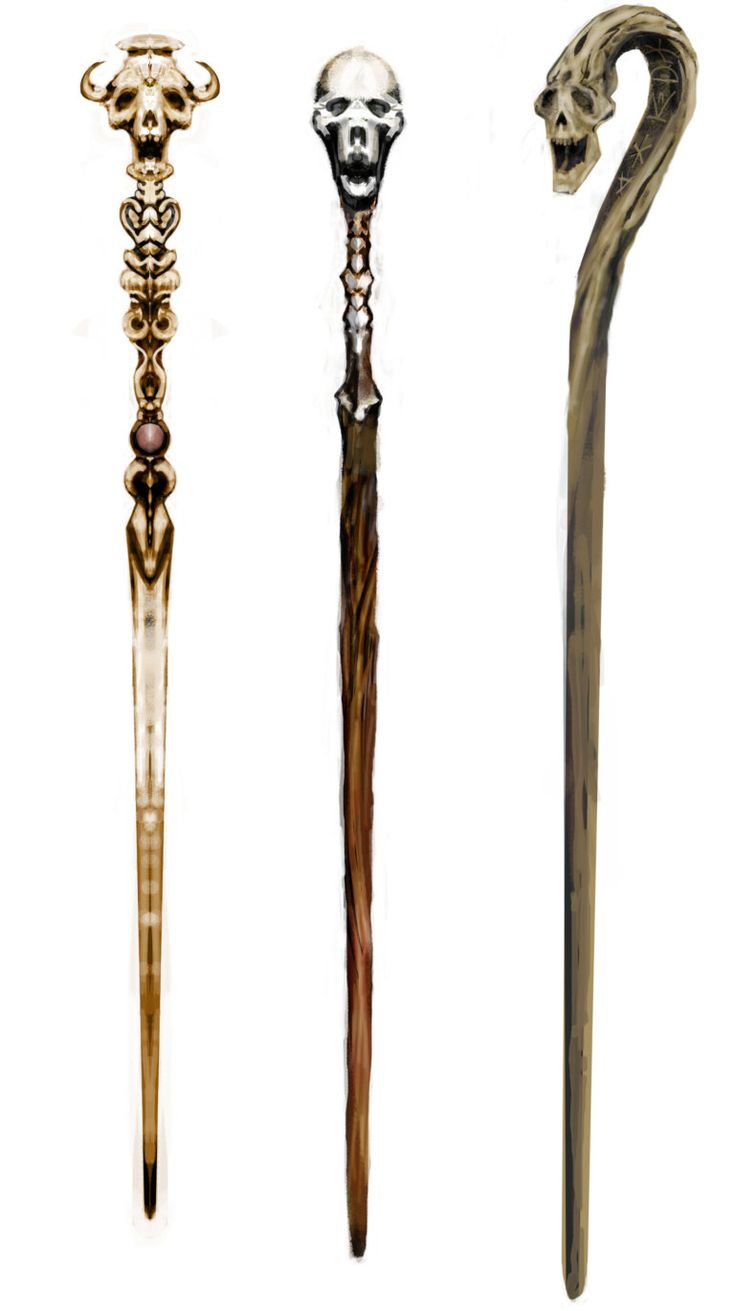 three different types of canes in various shapes and sizes, one with a skull on the top