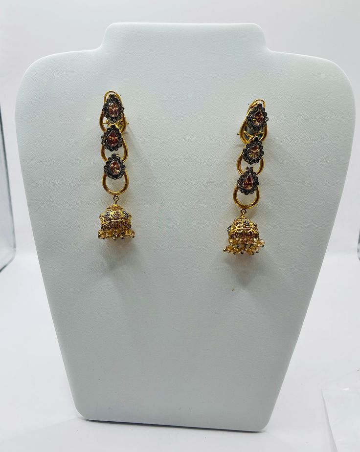 Beautiful bollywood indian pakistani dangle drop earring gold and shampagne colour the colours and design of the earrings make it very stylish and unique and gorgeous and luxurious features make it perfect for wedding mehndi and any evening  parties included  1 pairs of earring The item will come with the clear plastic bag and packaging. kindly wipe and store the jewellery in a plastic container after use. keep away from perfume for the jewellery to retain its shine. Please keep in mind that the Elegant Latkans Earrings For Formal Occasions, Elegant Dual-tone Jhumkas For Diwali, Elegant Dual-tone Jhumkas For Festive Occasions, Elegant Dual-tone Danglers For Festive Occasions, Elegant Festive Latkans Earrings, Dual-tone Chandbali Jewelry For Party, Temple Jewelry Style Gold Plated Drop Bridal Earrings, Gold Plated Drop Earrings For Bridal Temple Jewelry, Gold Plated Drop Bridal Earrings In Temple Style