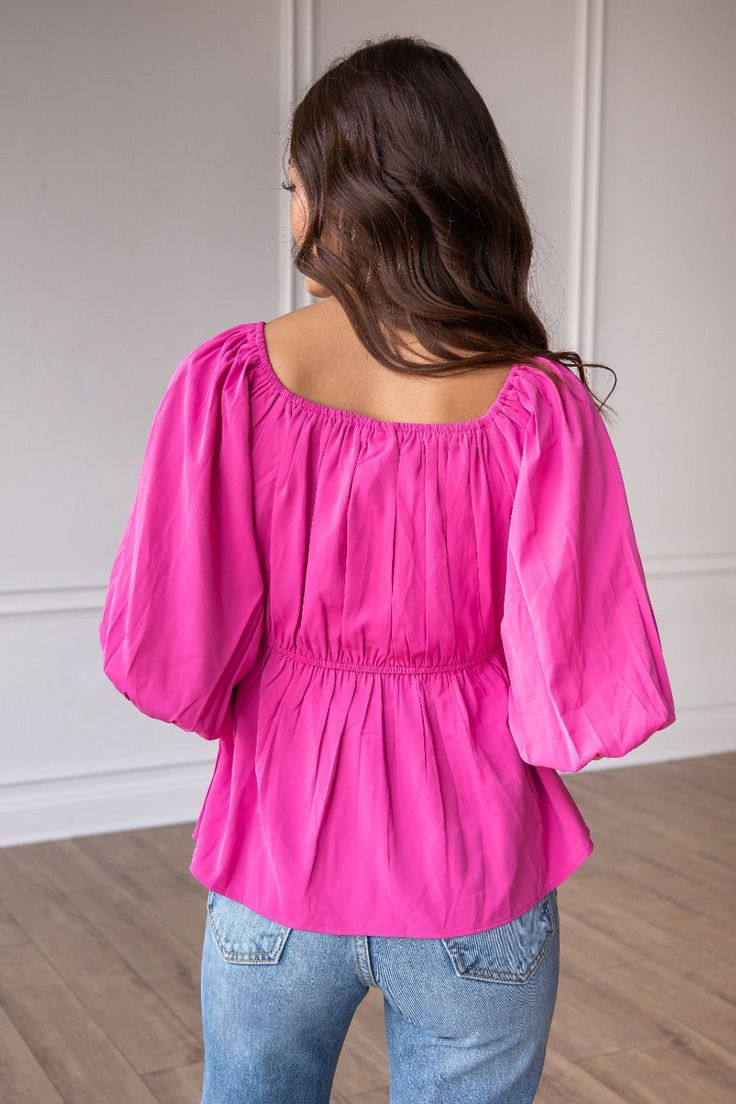 The Bold Blossom Pink Peasant Blouse is a charming and versatile off-the-shoulder top that brings a touch of bohemian flair to your wardrobe. With its relaxed and flowy silhouette, this blouse offers a casual yet stylish look. Fit: Relaxed Material: 100%PolyesterOur model is wearing: Size Small Bohemian Peasant Top With Billowy Blouson Sleeves, Billowy Bohemian Peasant Top With Blouson Sleeves, Billowy Blouson Sleeve Bohemian Peasant Top, Flowy Puff Sleeve Blouse With Smocked Back, Flowy Peasant Top With Lantern Sleeves, Bohemian Peasant Top With Puff Sleeves And Smocked Bodice, Bohemian Tops With Lantern Gathered Sleeves, Bohemian Balloon Sleeve Tops For Brunch, Bohemian Billowy Top With Blouson Sleeves