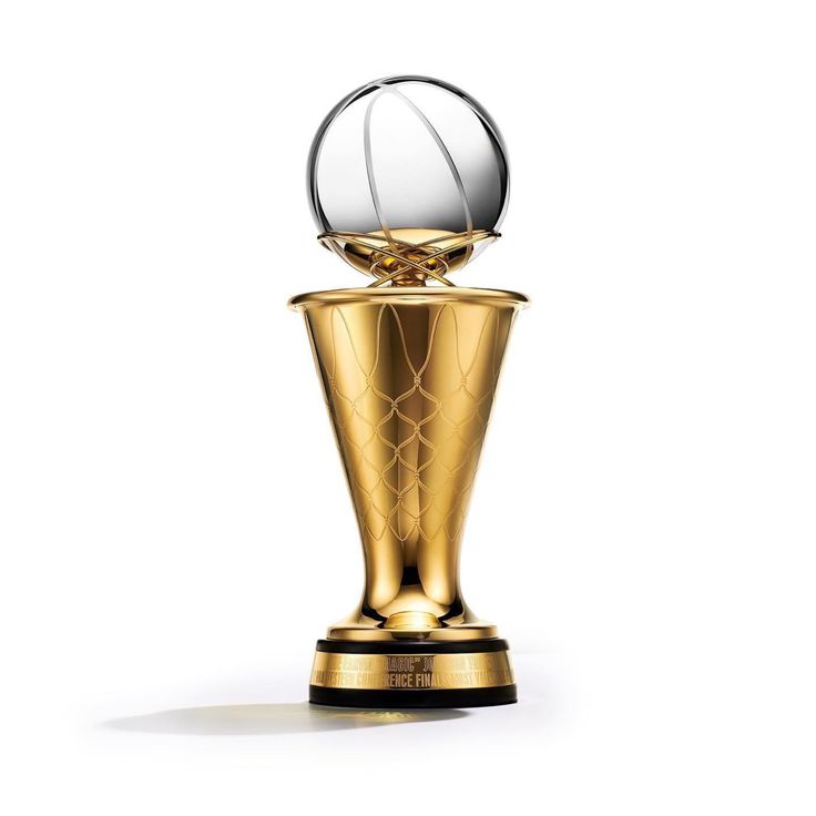 a golden trophy with a white ball on top