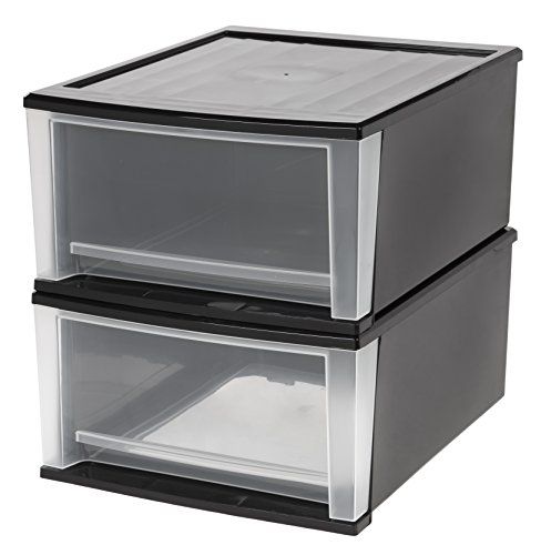 two plastic storage containers stacked on top of each other, one is black and the other is clear