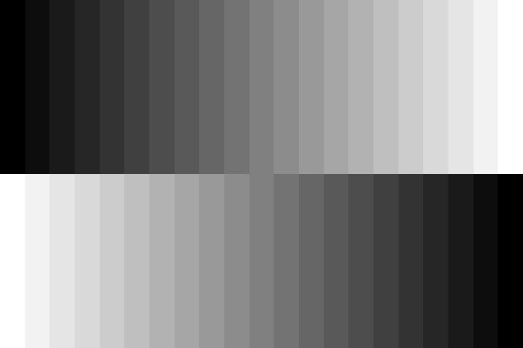 an abstract black and white background with vertical lines