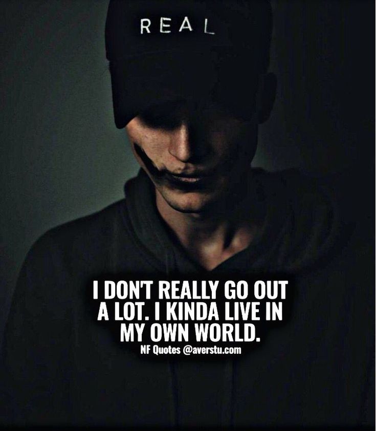 a man wearing a black hat with the words real in front of him and an image of