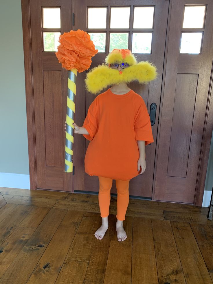 The Lorax Costume Diy, Easy Funny Costumes, Diy Lorax Costume, Lorax Halloween Costumes, Lorax Halloween, Parents With Baby, Lorax Costume, Funny Halloween Jokes, Bag Of Candy