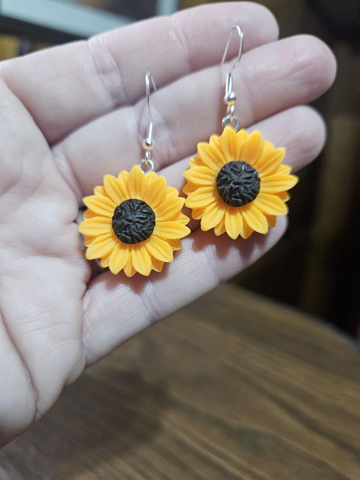 Beautiful yellow Sunflower earrings. Sunflower is approximately 1" round. Hope you enjoy! Yellow Drop Earrings For Gift, Yellow Earrings For Gift, Yellow Pierced Earrings As A Gift, Yellow Drop Earrings Gift, Yellow Earrings For Gifts, Round Flower Pierced Earrings Gift, Yellow Jewelry With Matching Earrings For Gifts, Adjustable Drop Flower Earrings, Adjustable Hypoallergenic Flower Earrings