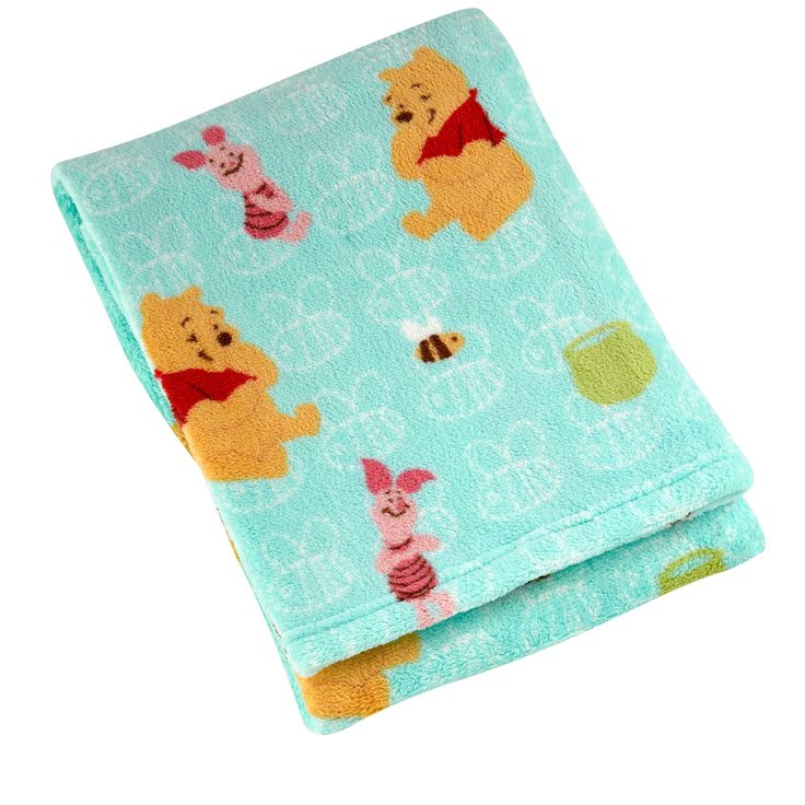 a blanket with winnie the pooh on it