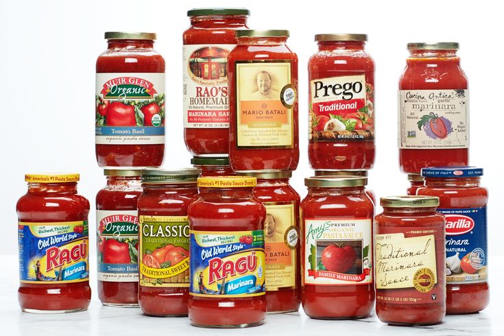 a group of jars filled with different types of food and condiments on top of each other