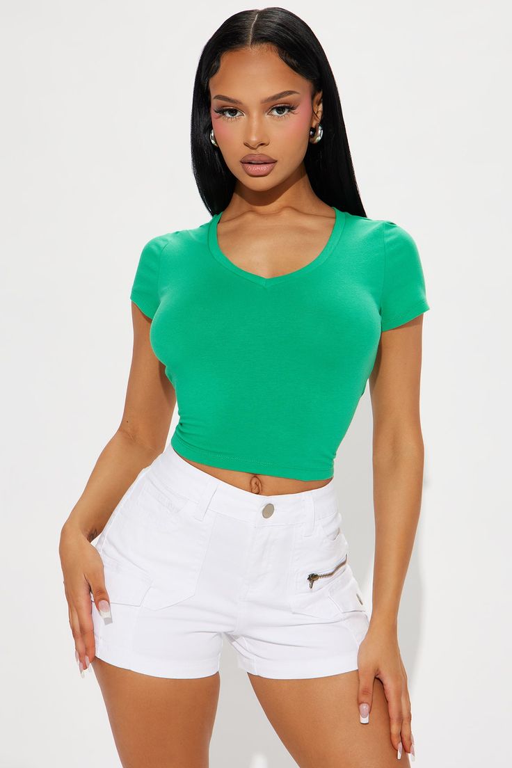 Available In Kellygreen, Pink, Green, Black, White, Red, Navy, Chocolate, Mauve, Orchid, Heather Grey, Sage, Olive, Light Blue, And Yellow. V Neck Cropped Short Sleeve Stretch 95% Cotton 5% Spandex Imported | Kaitlyn V Neck Crop Top in Kelly Green size Medium by Fashion Nova V Neck Crop Top, Neck Crop Top, Kelly Green, Womens Clothing Tops, Fashion Nova, Heather Grey, Short Sleeves Tops, Crop Top, Light Blue