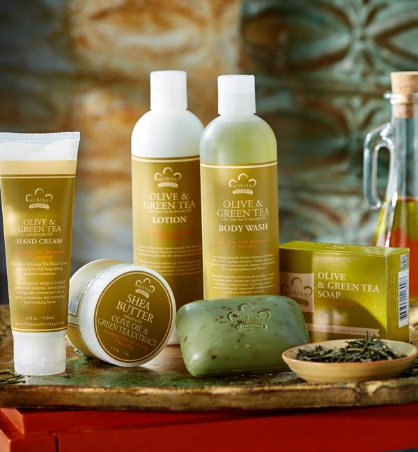 Olive Oil enriched with Organic Shea Butter, Vitamin E and Green Tea Extract helps to restore moisture, combat signs of aging and protect skin against environmental exposure.   Treat your skin with our luxurious Olive Oil & Green Tea collection. Green Tea Body Wash, Green Tea Soap, Nubian Heritage, Tea Soap, Bath And Body Products, Organic Shea Butter, Green Tea Extract, Shea Moisture Products, Tea Collection