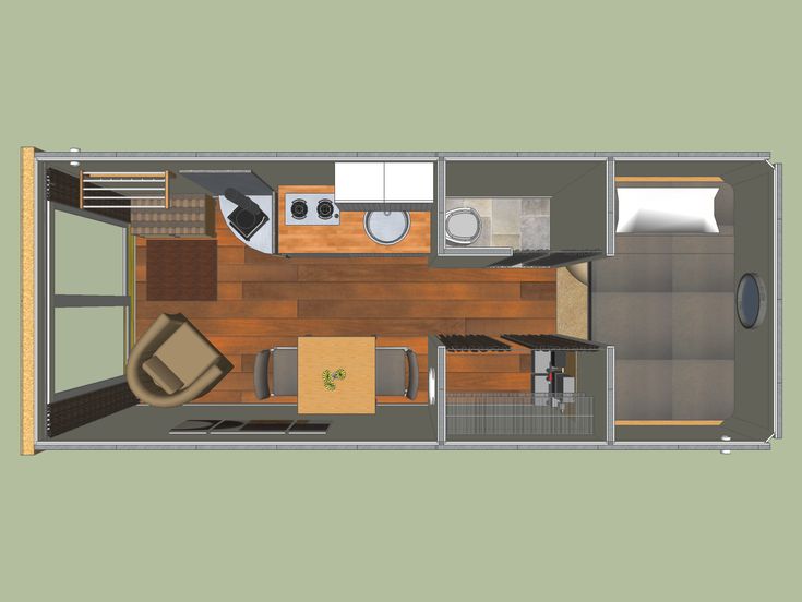 an overhead view of a tiny house with wood flooring