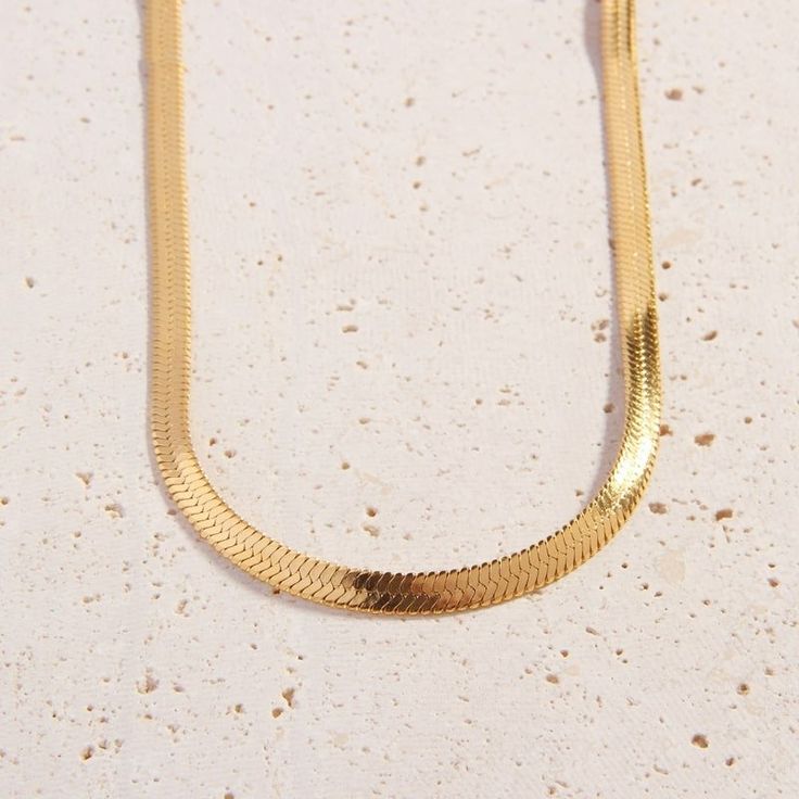 A must-have for any growing collection, add a touch of shimmer to your look with the subtle link design of our 18k gold plated Cali Chain. Mix and match this piece with your fave Cali Tiger pendants and layered chains like the trend setter we know you are!    Please note we frequently sell out of this item. We advise you to place your order while it is available to avoid any disappointment.  Details:   Total length 50cm   Chain 5mm Width   18k Gold Plated   FREE Insured Shipping (Worldwide) Tiger Pendant, Herringbone Chain, Link Design, Layered Chains, Sell Out, The Trend, Best Seller, Trend Setter, Gold Finish