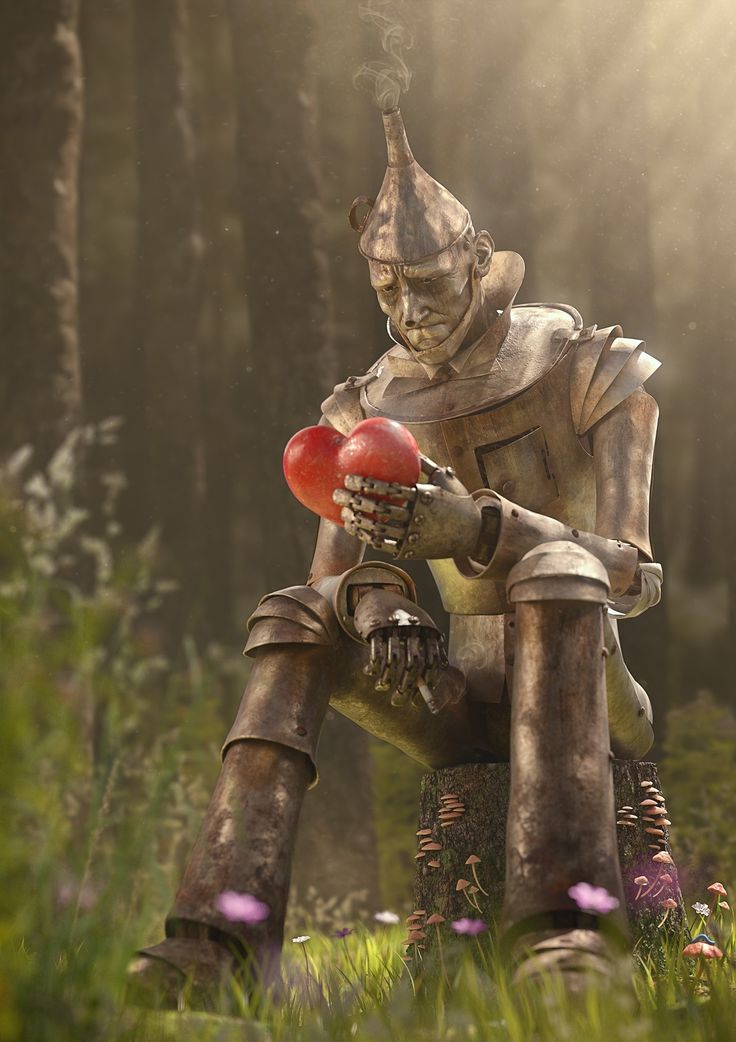 a robot sitting in the middle of a forest holding a red ball with both hands