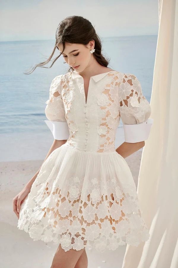 Floral A-line Puffy Sleeved Lace Mini Dress | MEAN BLVD Feminine Puff Sleeve Lace Dress For Party, Spring Puff Sleeve Dress With Scalloped Lace, Chic Short Sleeve Lace Dress For Wedding, Spring Dress With Scalloped Lace And Puff Sleeves, Chic Lace Dress With Short Sleeves For Wedding, Chic Wedding Lace Dress With Lace Cuffs, Chic Lace Puff Sleeve Dress For Spring, Chic Lace Puff Sleeve Dress For Summer, Elegant Puff Sleeve Lace Dress