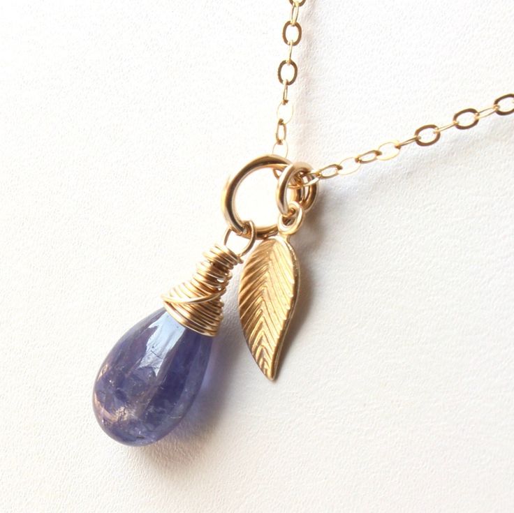 5983 Tanzanite Pendant or Necklace Gold Filled wire wrapped natural violet blue gemstone leaf charm minimalist dainty solitaire choker mothers day birthday anniversary or holiday gift for her women mom sister wife girlfriend niece aunt grandma cousin best friend colleague. Enjoy the beauty & power of natural gemstones - find TANZANITE healing properties below. THIS LISTING IS FOR THE NECKLACE ONLY Earrings shown for illustration and listed separately MATERIALS & DIMENSIONS ✦ Natural TANZANITE, v Handmade Purple Jewelry In 14k Gold Filled, 14k Gold Filled Charms Jewelry As Gift, Elegant Adjustable Handmade Charm Necklaces, Elegant Handmade Adjustable Charm Necklaces, Elegant Handmade Adjustable Charm Necklace, Everyday Teardrop Charm Jewelry, Dainty Dangle Charm Necklaces As Gift, Dainty Dangle Charm Necklaces For Gifts, Delicate Purple Sterling Silver Jewelry