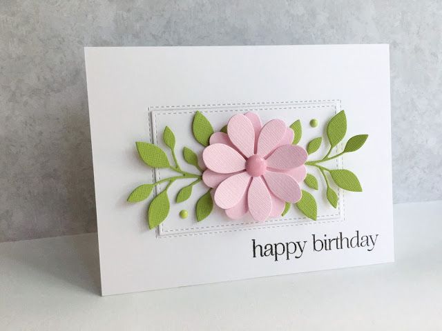 a birthday card with pink flowers and green leaves