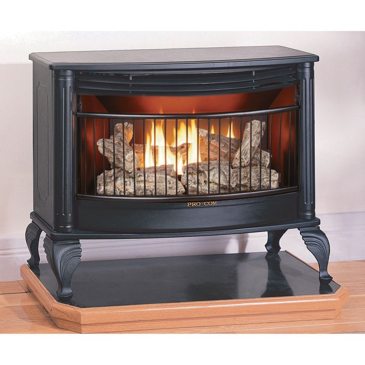 an electric fireplace with logs burning in it