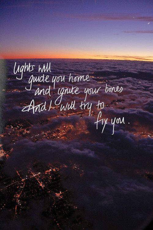 the view from an airplane looking down at clouds and lights in the sky with a quote written on it