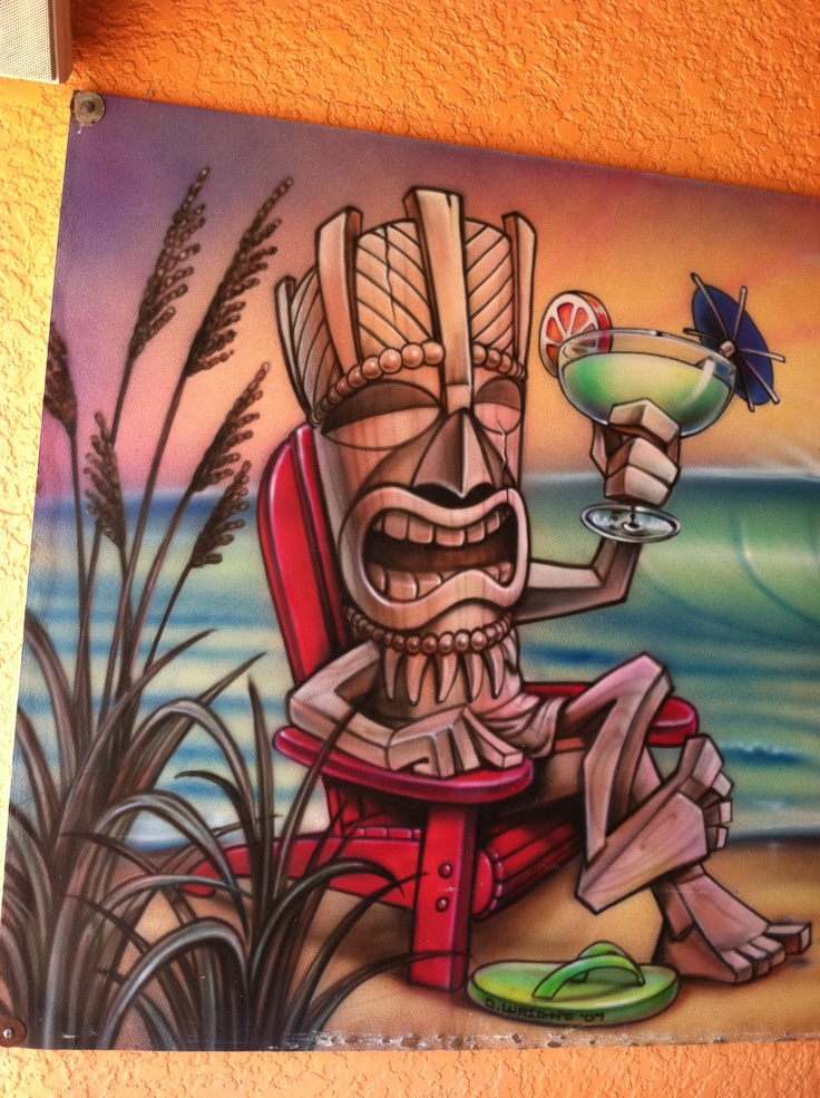 a painting of a tiki sitting on a beach chair holding a cocktail in his hand