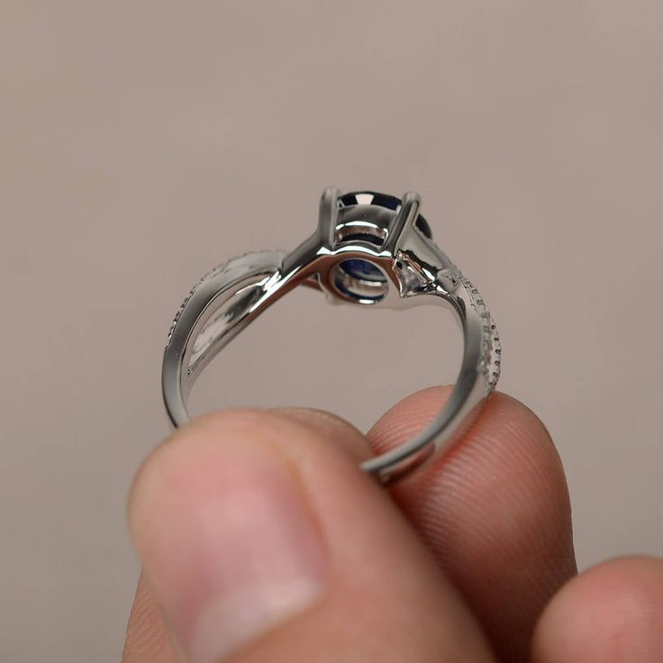 This is a gorgeous handmade creation. Its beauty is its simplicity & Elegance. The 7*7 mm round shape faceted Lab Sapphire is crafted in solid sterling silver and with rhodium plated. All item is sent in a beautiful gift box If you have any idea of design your ring,pls contact me directly. You can realize more lovely stuff clicking the link https://www.etsy.com/shop/knightjewelry?refshopsection_shophome_leftnav Please leave the correct address and you phone number for delivering successfully Modern Crystal Ring With Prong Setting, Promise Ring With Bezel Setting And Open Band, Open Band Bezel Setting Promise Ring, Open Band Promise Ring With Bezel Setting, Bezel Set Open Band Promise Ring, White Gold Ring With Polished Finish, 14k White Gold Gemstone Rings, White Gold Diamond Ring With Gemstone, Polished Round Diamond Ring In Fine Jewelry Style