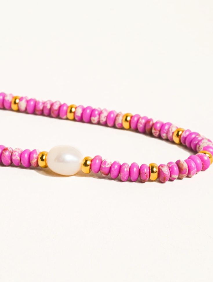 Millie Purple Boho Handmade Beaded Pearl Necklace Boho Handmade Beaded Pearl Necklace 18K Gold Plating Colored Stone Freshwater Pearl Chain Length: 15 inches Extension Length: 2 inches Pink Spacer Beaded Necklace For Festivals, Pink Spacer Beads Necklace For Festival, Pink Spacer Bead Necklaces For Festivals, Pink Hand-strung Jewelry For Festival, Hand-strung Pink Jewelry For Festivals, Heishi Bead Bracelet With Beaded Chain, Heishi Beaded Chain Bracelet Jewelry, Pink Hand-strung Necklace As Gift, Pink Hand-strung Necklace For Gift