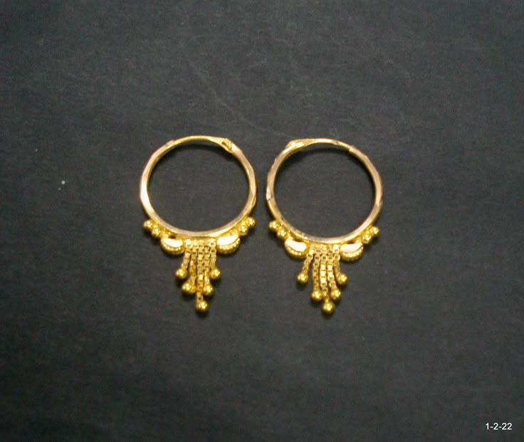 Vintage 18kt gold earrings earring pair from rajasthan india. great handmade design good for jewelry collection. It can be wear in nose as well. Note - please check pictures carefully for more details. Size - 2.8/1.8 cm. Weight - 1.960 grams. Metal - 18kt yellow gold. Traditional Gold Cutdana Earrings, 22k Gold Jewelry With Matching Earrings For Puja, 22k Gold Cutdana Earrings For Puja, Traditional Gold Plated Cutdana Earrings, 22k Gold Cutdana Earrings, Traditional 22k Gold Hoop Earrings For Wedding, Festive 22k Gold Traditional Earrings, 22k Yellow Gold Cutdana Earrings, Gold Cutdana Earrings In 22k Gold