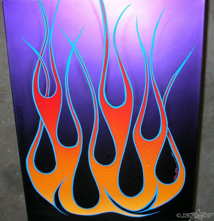 an art piece with flames painted on it