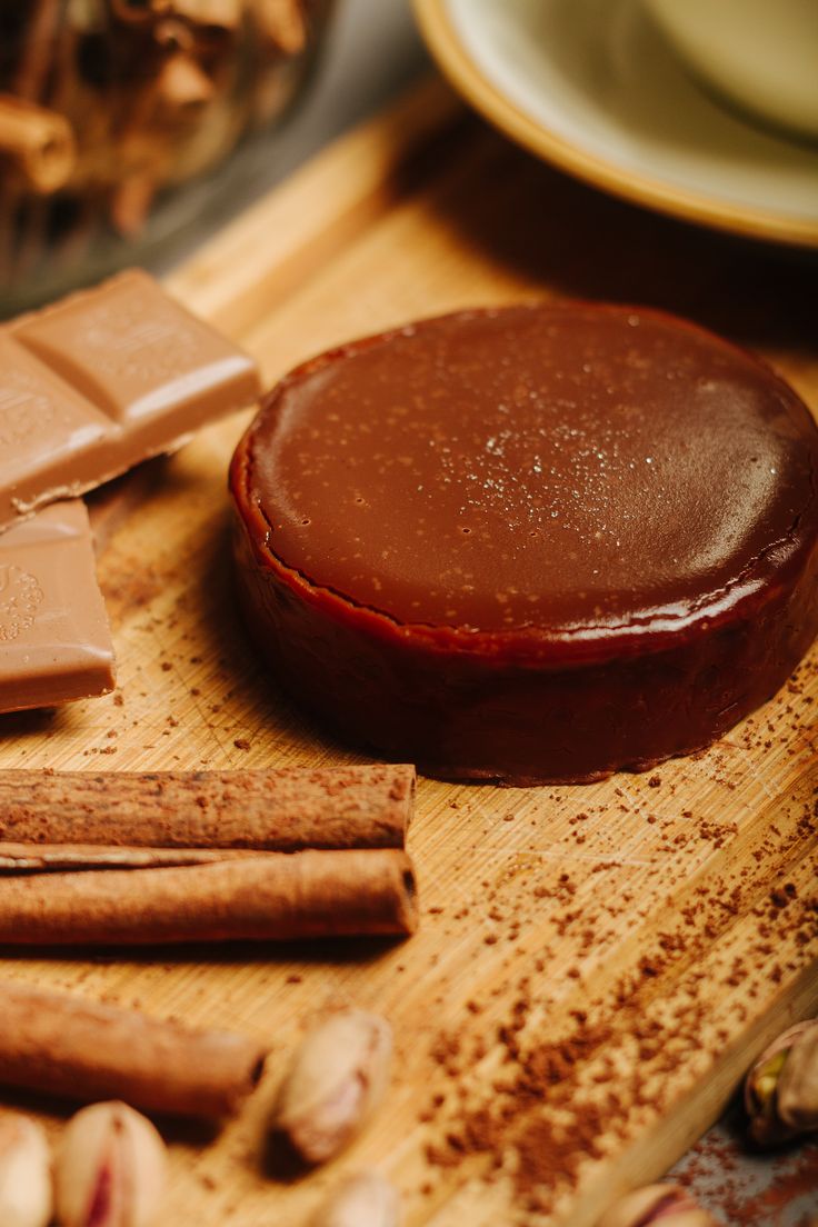 chocolate and nuts on a wooden cutting board