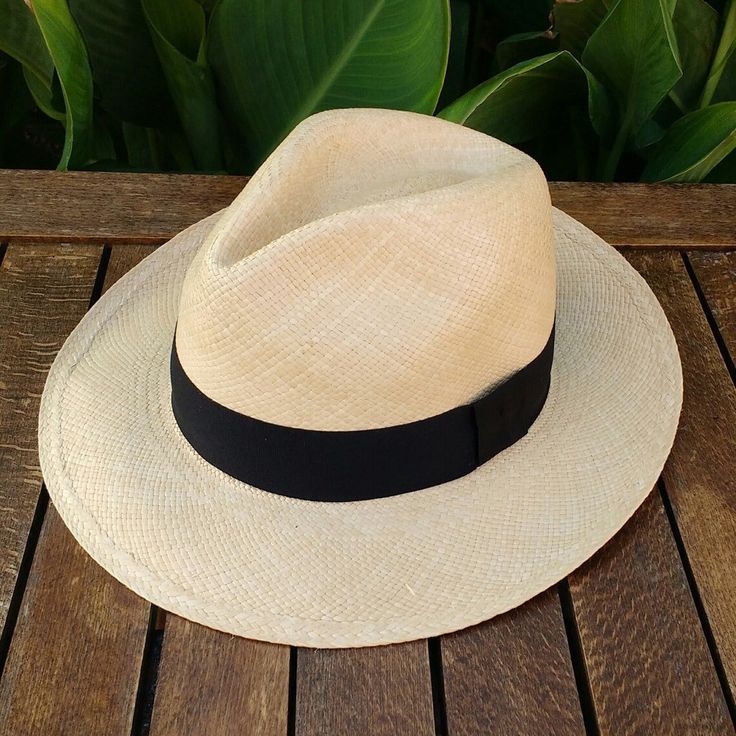 Handmade Panama Hat ~ in Natural Colour with Black Band ~ Genuine Panama hat handwoven with Toquilla palm ~ ~ Handwoven in Ecuador ~ ~ Possible to roll for easy travel ~ ~ Inside comfort band ~ Other colour hats and bundles available from our store > https://www.etsy.com/shop/personalisedpanamas Classic Woven Hats For Vacation, Classic Woven Fedora Hat, Handmade Casual Panama Hat With Flat Brim, Kentucky Derby Woven Panama Hat, Classic Woven Panama Hat For Vacation, Woven Panama Hat With Curved Brim, Kentucky Derby Woven Panama Hat In Toquilla Straw, Handmade Fedora Panama Hat In Toquilla Straw, Classic Natural Hat For Vacation