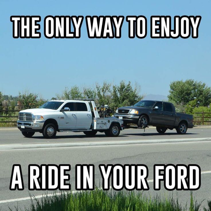 two trucks on the road with one towing another behind it that says, the only way to enjoy a ride in your ford