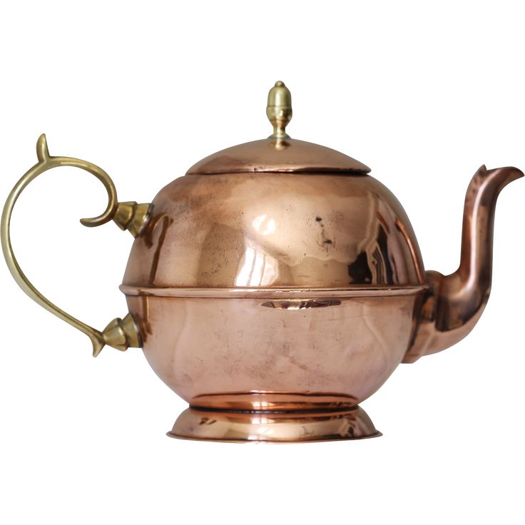 a tea pot with a handle on it