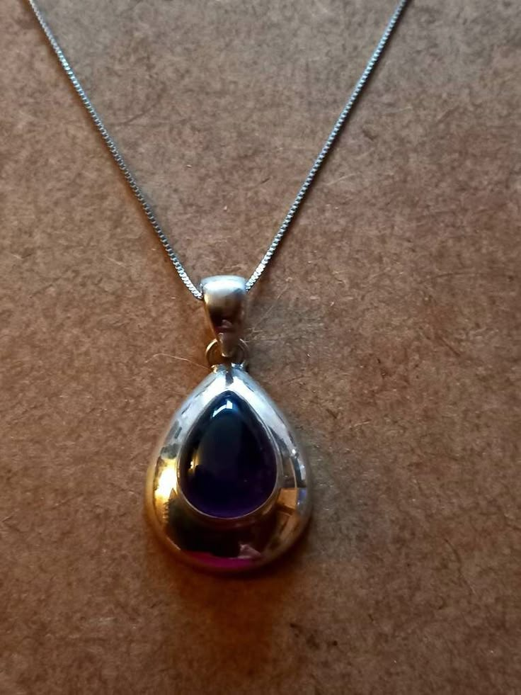 "Sacredspacejewels - Beautiful Handmade \"Amethyst\" Gemstone pendant set in 925 Silver ..Size - 1 inch Diameter comes  on 18/20 inch 925 Silver Chain ..The Spiritual meaning of Amethyst is   Peace, Balance and Clear Vision\" (Clarevoyance) used in healing to Release negative energy  and  enhance Clear vision ..(to see your path clearly) ...🌟" Sterling Silver Teardrop Jewelry With Stone Setting, Spiritual 925 Sterling Silver Gemstones, Sterling Silver Drop Jewelry Hallmarked, Silver Amethyst Teardrop Jewelry, Amethyst Pendant With Polished Finish, Amethyst Teardrop Pendant For Jewelry Making, Teardrop Amethyst Pendant For Jewelry Making, Silver Teardrop Amethyst Jewelry, Purple Sterling Silver Necklace With Polished Finish