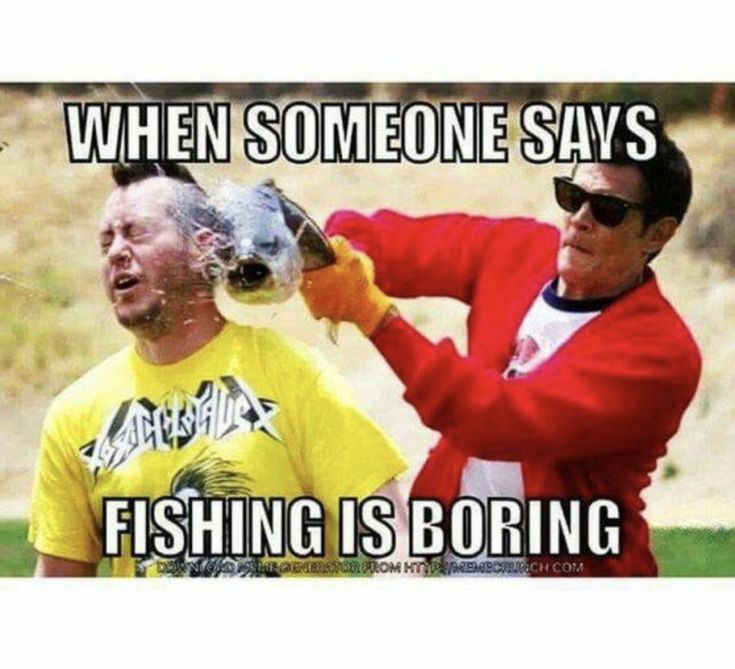 two men in yellow shirts and one has a fish on his head while the other man holds