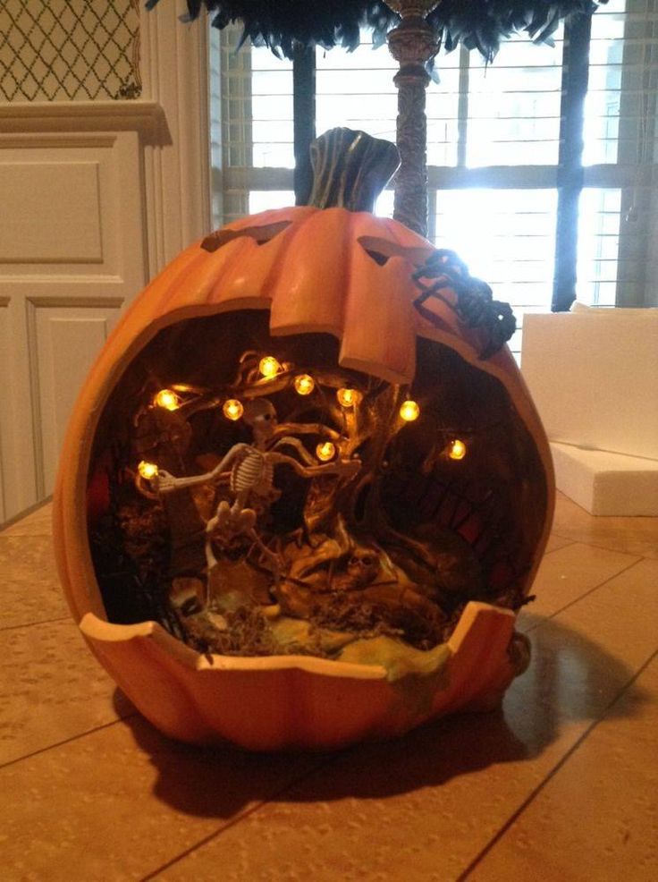 a carved pumpkin with some lights in it