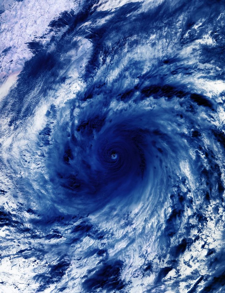 an image of a storm in the sky with clouds and water around it, as seen from space