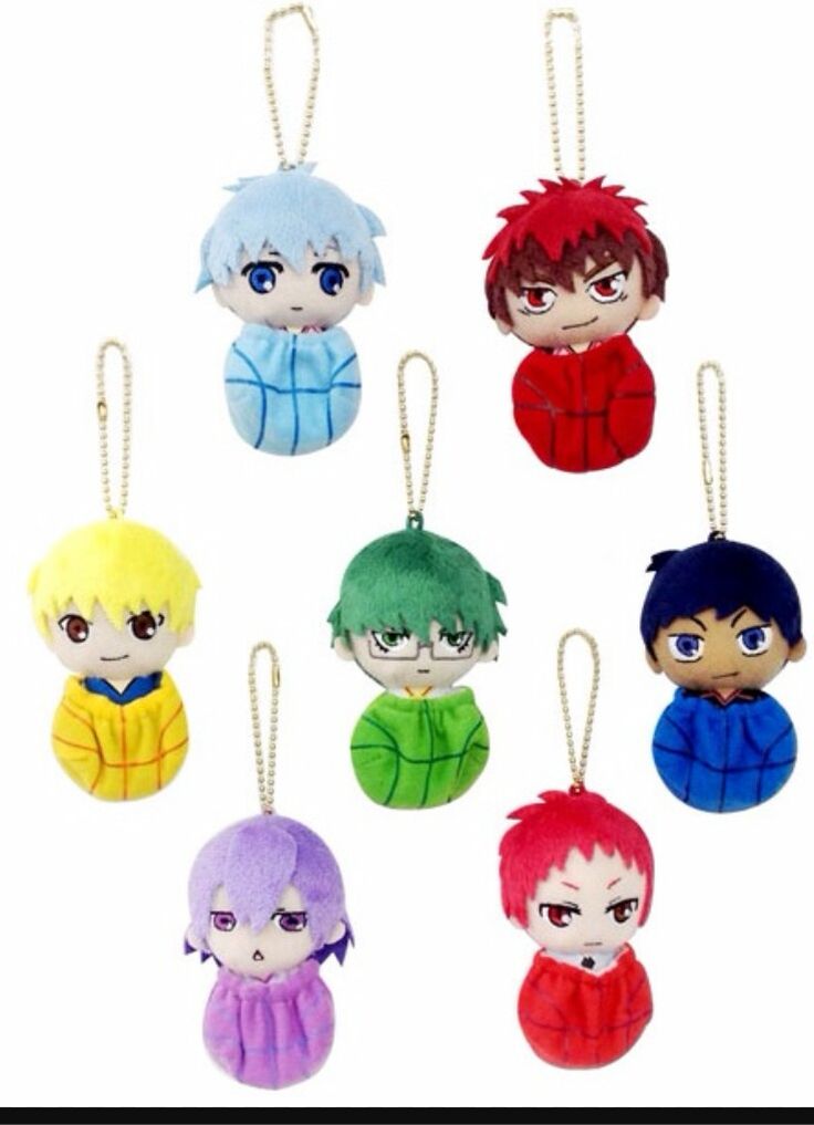 an assortment of key chains with anime characters hanging from it's ends, all in different colors