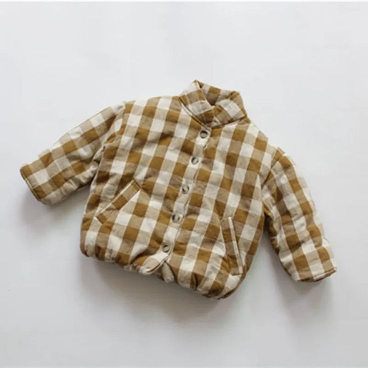 Introducing the Unisex Kids Plaid Padded Jacket, a cozy winter essential for your little ones. This jacket is crafted with a cotton-polyester blend material, ensuring comfort and durability. The single-breasted closure and mandarin collar add a touch of sophistication, while the pockets provide practicality. With its woven plaid pattern and regular fit, this jacket is suitable for boys and girls aged 2–6 years. Keep your kids warm and stylish this winter with this adorable outerwear piece. ❄️🧥 Stylish Baby Clothes, Kids Plaid, Baby Fits, Plaid Coat, Kid Clothes, Stylish Baby, Baby Style, Baby Warmer, Kids Style