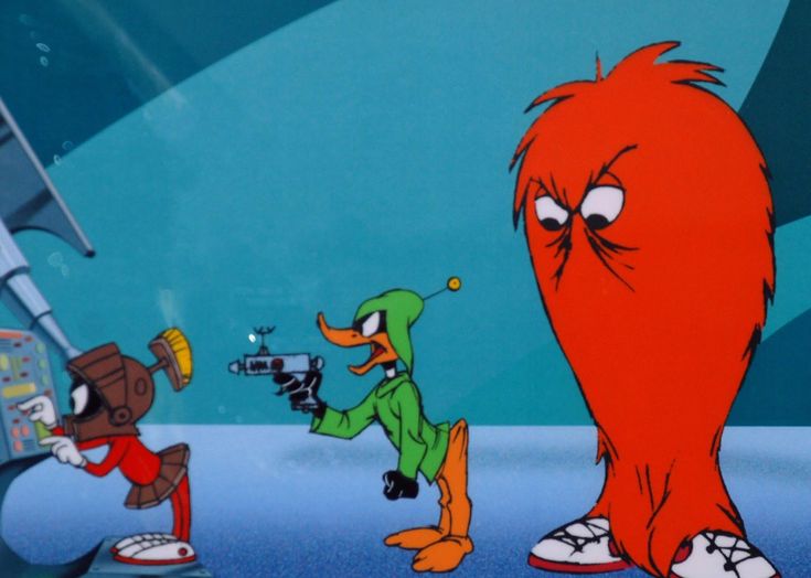 an orange cartoon character standing next to two other characters