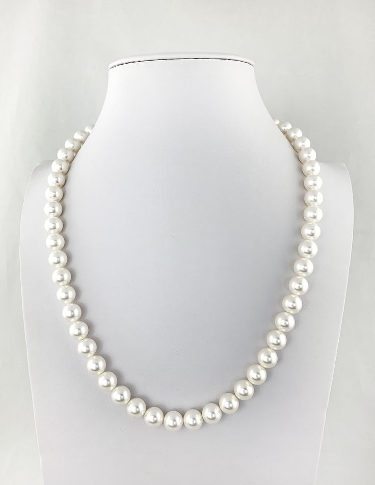 "Timeless elegance with a sleek modern twist! This strand of Mother of Pearls have a singular way of making virtually any ensemble seem just that little bit classier...a little more sophisticated. But, hang one...you don't want too much of that either. So how do you get the benefits of pearls while keeping the edginess of your carefully crafted contemporary aesthetic intact....by picking the right size, shape and color Alternative to real pearls at a quarter of the price, with the same classic e Classic Single Strand Beaded Necklaces, Classic Single Strand Beaded Necklace, Classic Single Strand Beaded Necklace For Everyday, Classic Beaded Necklaces With Round Beads, Classic Beaded Necklaces With Round Beads For Everyday, Classic Adjustable Single Strand Beaded Necklace, Classic Polished Beads Jewelry For Formal Occasions, Classic Single Strand Jewelry For Everyday, Elegant Adjustable Sterling Silver Beaded Necklaces