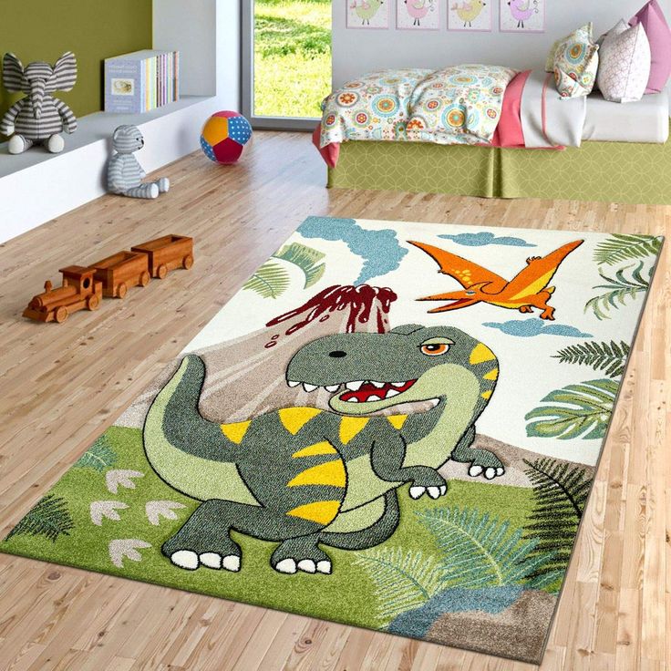 a child's bedroom with dinosaur rugs and toys