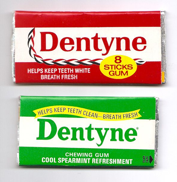 two dentyle toothpaste bars sitting next to each other on a white surface