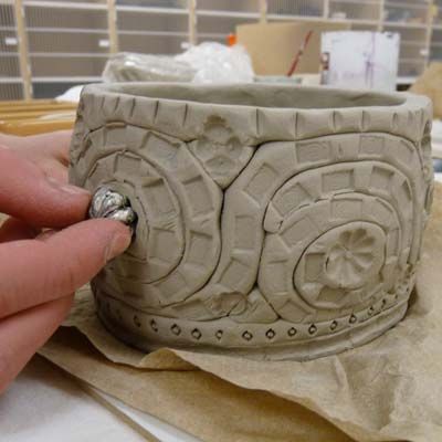 great tutorial - but using extruder for coils would definitely improve similarity of coils &  cut time! Ceramics1. Coil pot. Pottery Ideas For Beginners, Coiled Pottery, Beginners Ceramics, Coil Pot, Clay Lesson, Coil Pottery, Coil Pots, Beginner Pottery, Kids Clay