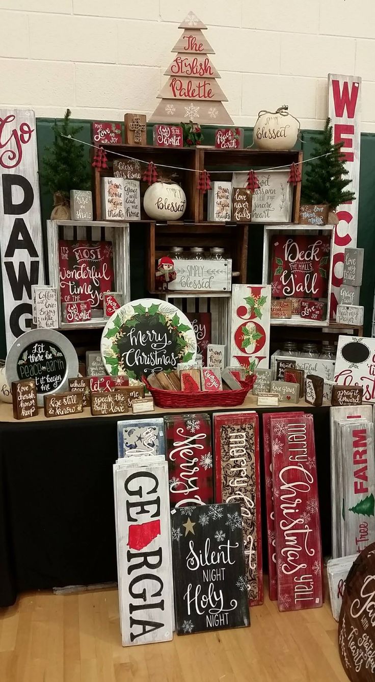 christmas decorations and signs are on display at the store