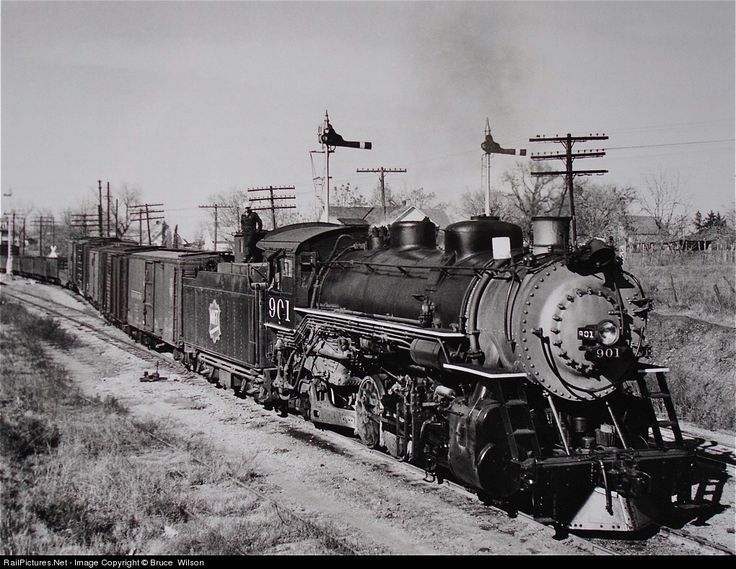 an old black and white photo of a train