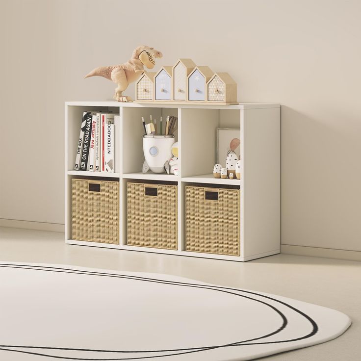 a white shelf with baskets and toys on it