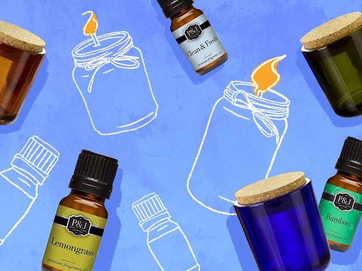 several bottles of essential oils on a blue background