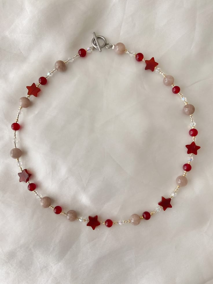 this gorgeous necklace is 15  inches long!  Made with a variety of plastic and acrylic beads!  Please message if you have any questions! ⭐️♥️ Cheap Adjustable Star-shaped Beaded Necklaces, Affordable Red Jewelry With Star Charm, Red Star-shaped Beaded Jewelry, Star-shaped Beaded Chain Necklace For Gift, Star-shaped Beaded Necklace For Gift, Red Necklace With Star Charm For Gift, Red Necklace With Star Charm As Gift, Handmade Red Star Jewelry, Star-shaped Beaded Necklaces For Gifts