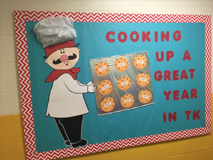 a sign that says cooking up a great year in the kitchen with cookies on it